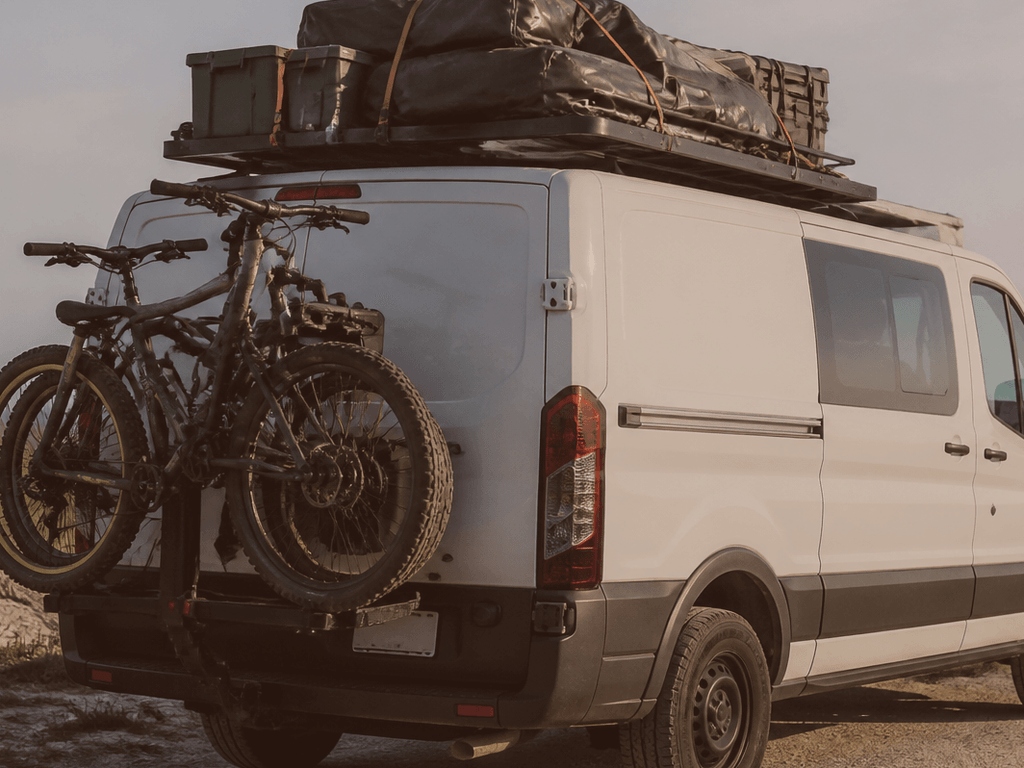 Assateague bike rack van loading: straps before the dirt road swagger — supporting Beach Blog photo, Ocean City, Maryland