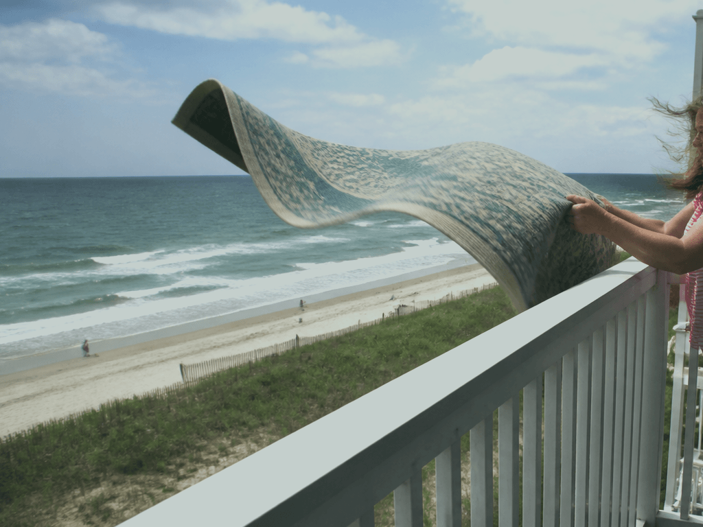 Balcony rug shake: always downwind of neighbors — supporting Beach Blog photo, Ocean City, Maryland