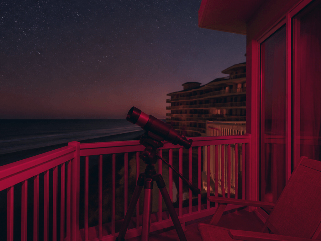 Balcony telescope nights: dim lights, quiet voices — supporting Beach Blog photo, Ocean City, Maryland