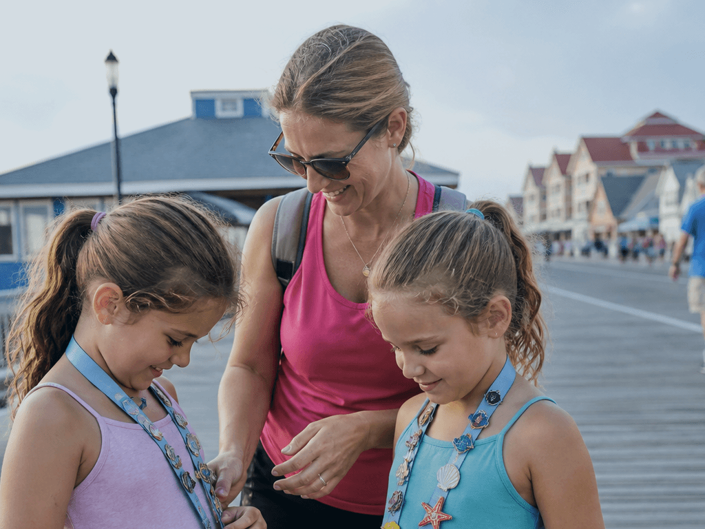 Beach badge on a lanyard: kids lose pockets, not necks — supporting Beach Blog photo, Ocean City, Maryland