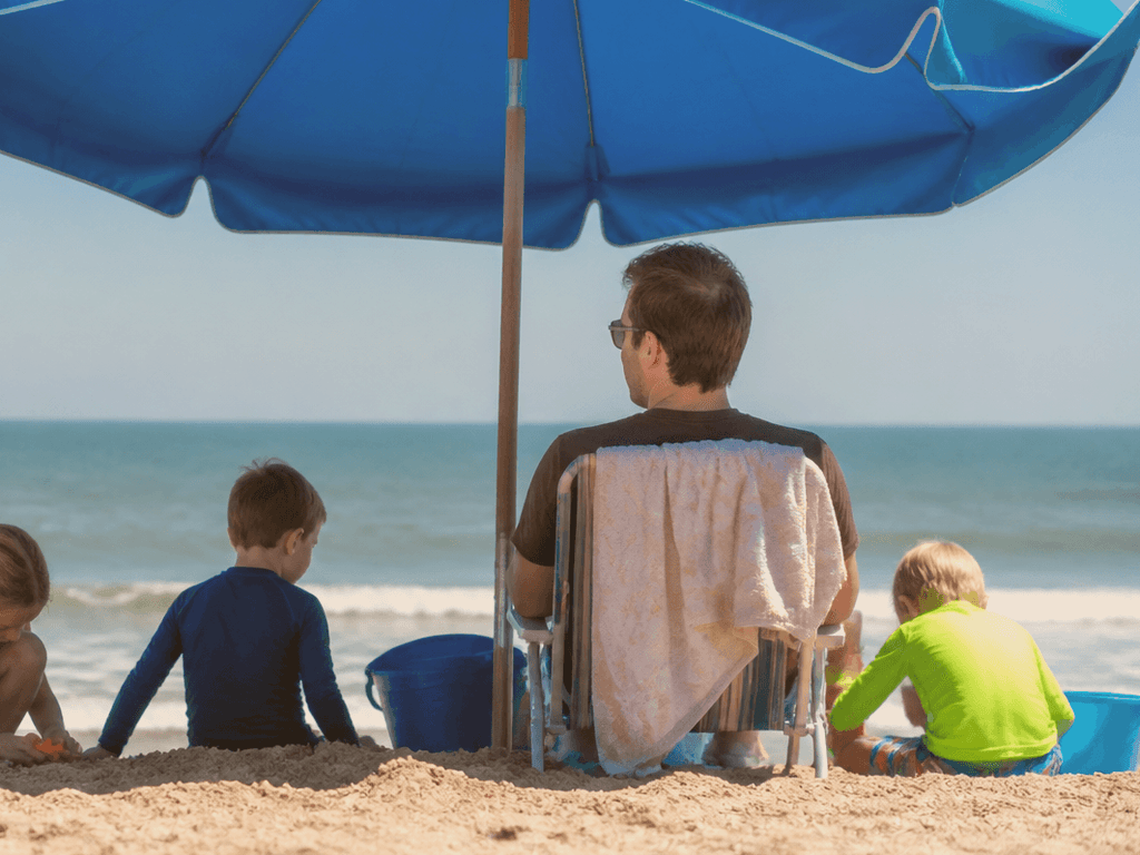 Beach morning with three kids before noon: claim the sand, then quit while ahead — supporting Beach Blog photo, Ocean City, Maryland