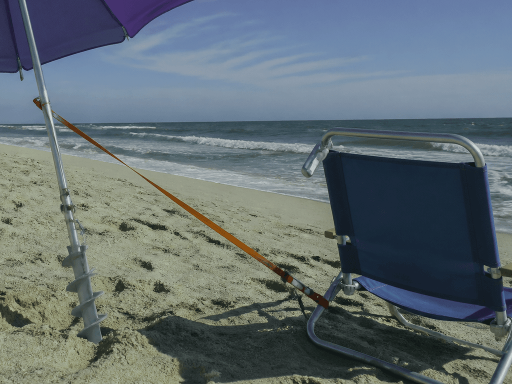 Beach umbrella anchor reality: sand screws beat hope — supporting Beach Blog photo, Ocean City, Maryland