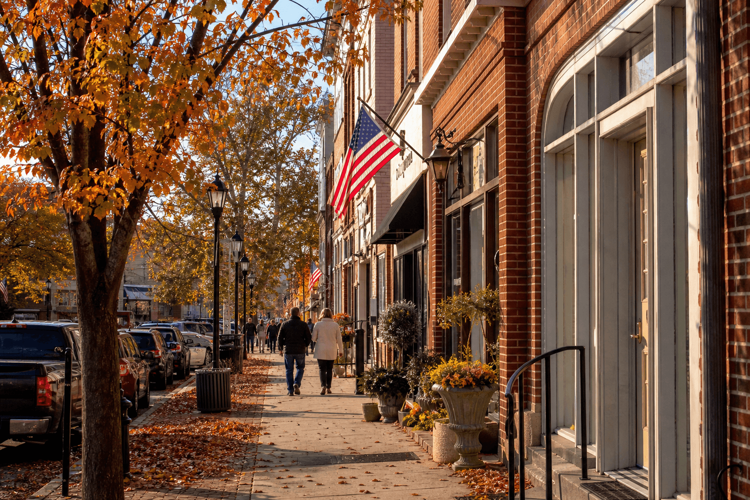 Berlin Maryland Main Street in soft autumn light with brick buildings and fall leaves — Beach Blog photo near Ocean City