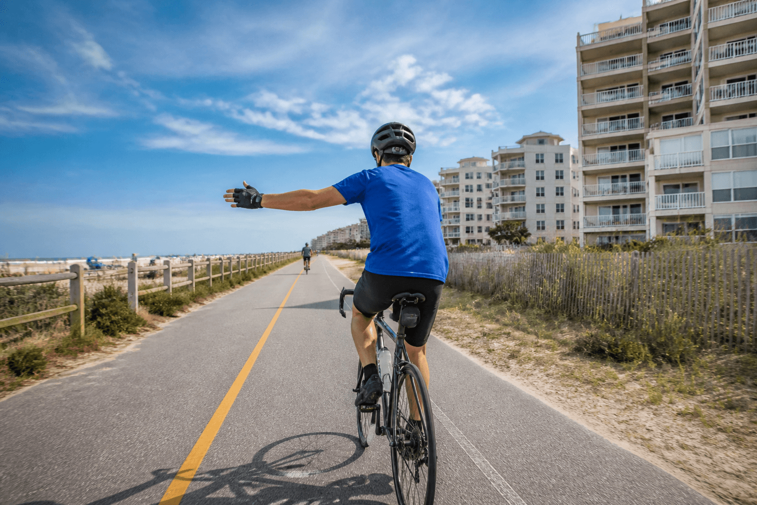 Bike left-turn hand signals on Coastal Highway edges — Beach Blog photo, Ocean City, Maryland