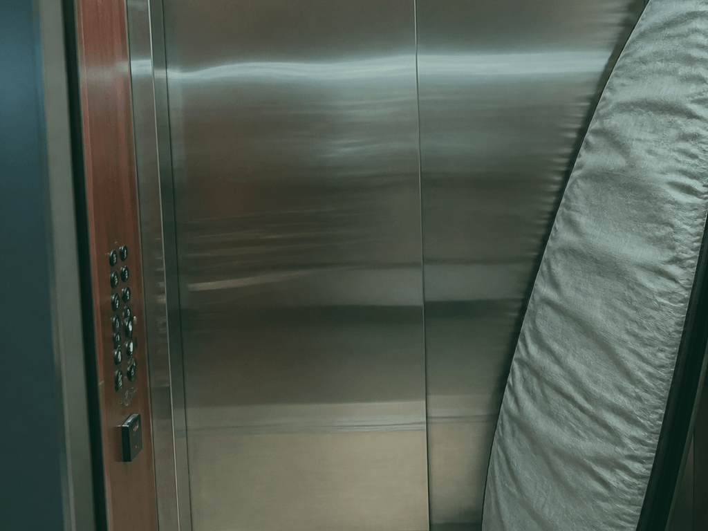 Board sock ding prevention in condo elevators — supporting Beach Blog photo, Ocean City, Maryland