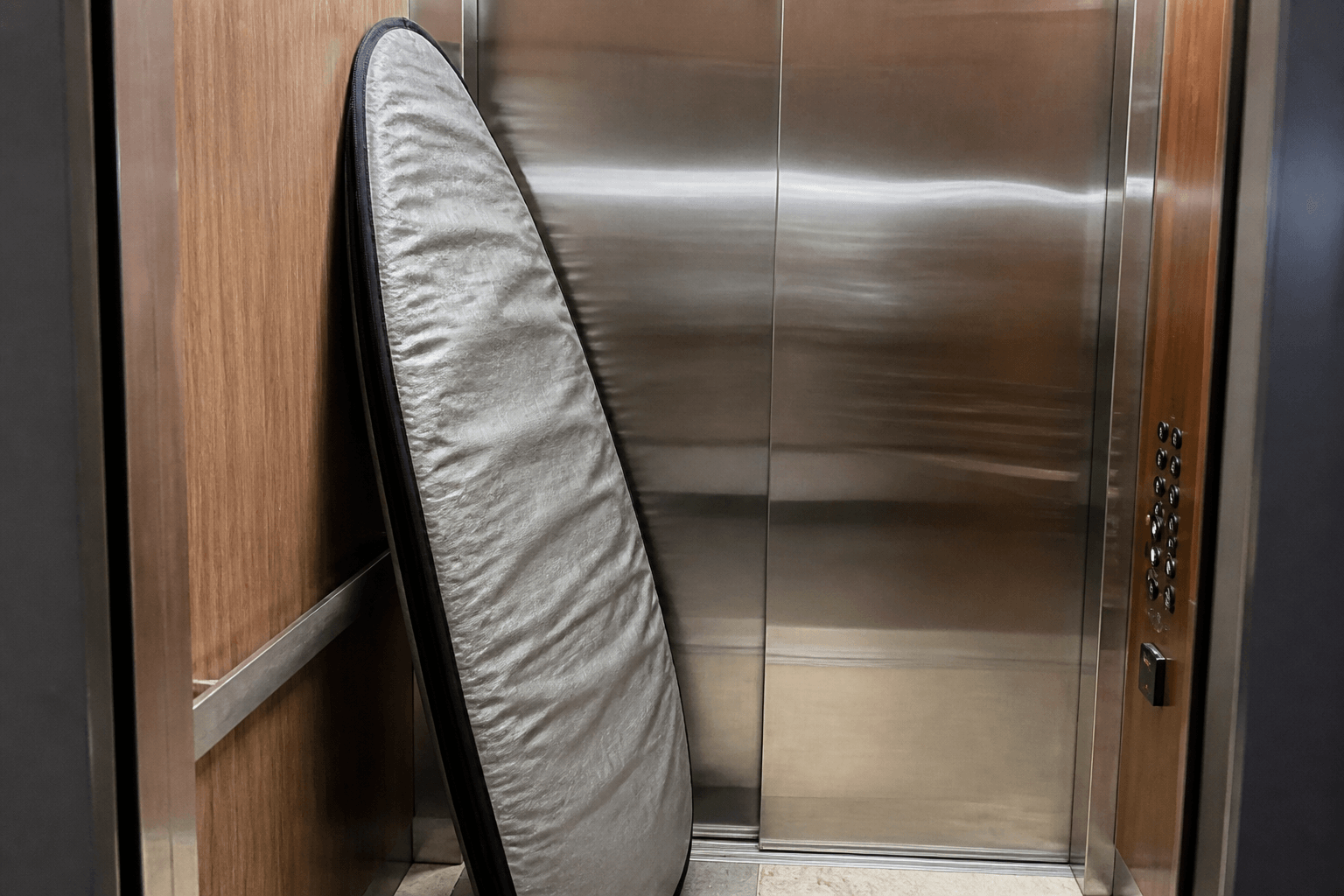 Board sock ding prevention in condo elevators — Beach Blog photo, Ocean City, Maryland