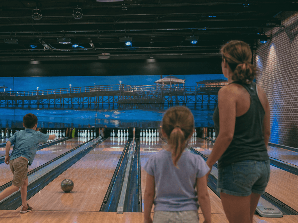 Bowling rainy night with competitive kids: bumpers, snacks, scoreboard peace treaties — supporting Beach Blog photo, Ocean City, Maryland