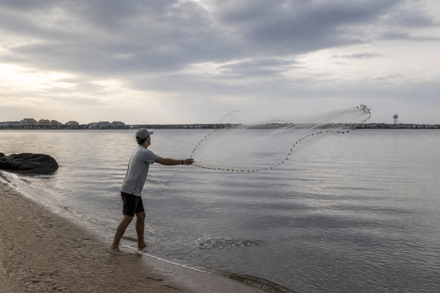 Cast net beginner humility: practice on grass before you invent pier comedy — Beach Blog photo, Ocean City, Maryland