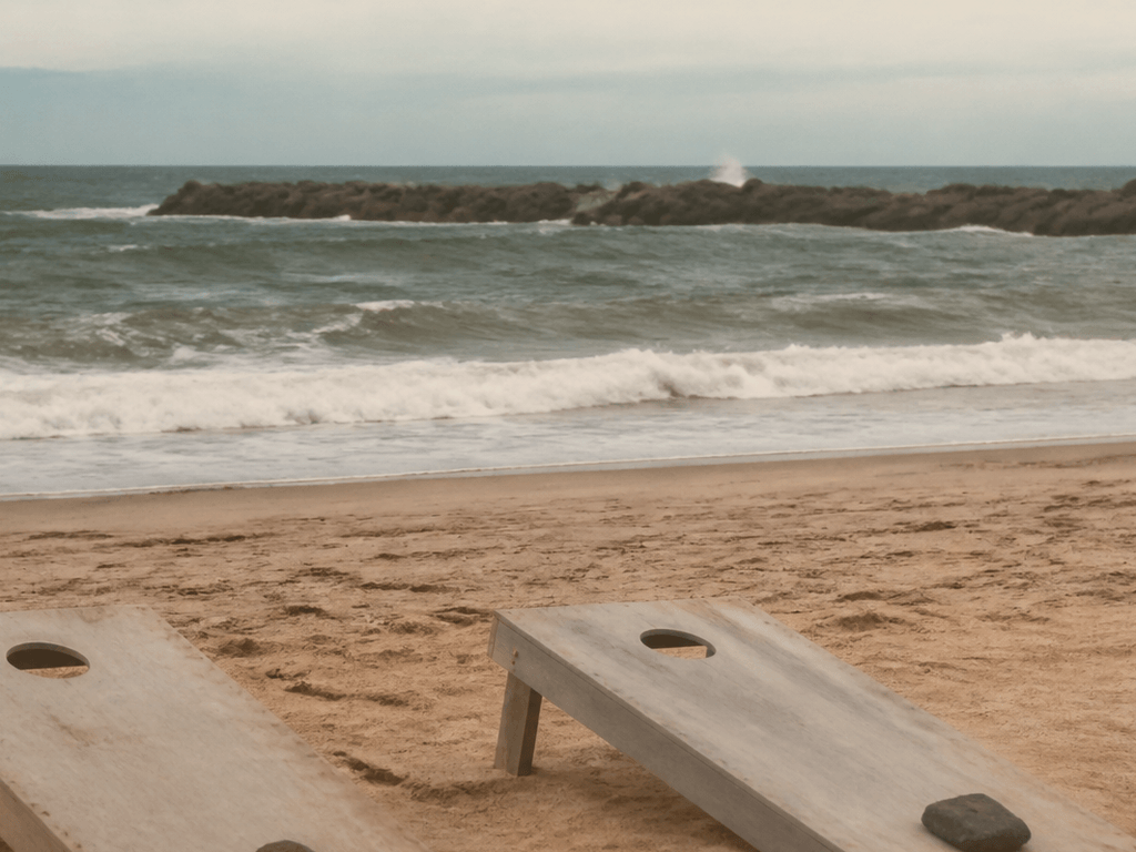 Cornhole boards need wind weights on the beach — supporting Beach Blog photo, Ocean City, Maryland