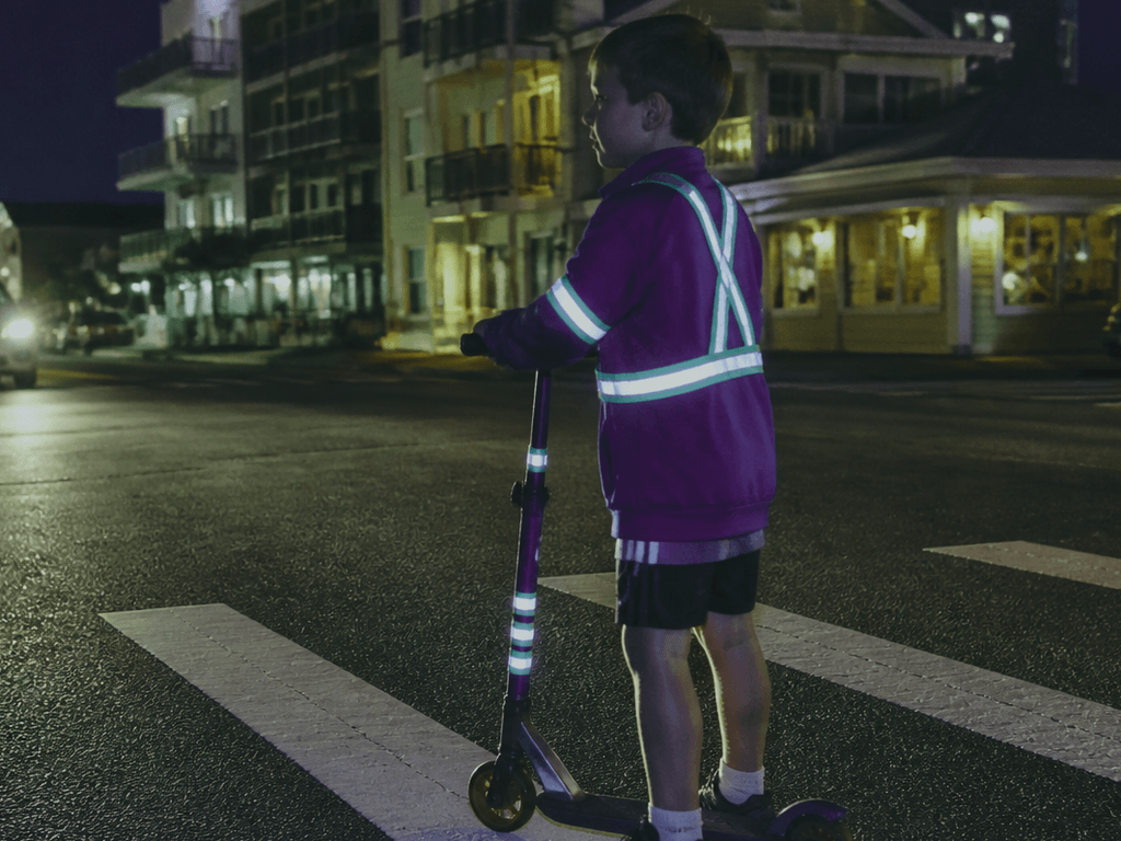 Night crosswalks: reflective gear for kids on scooters — supporting Beach Blog photo, Ocean City, Maryland