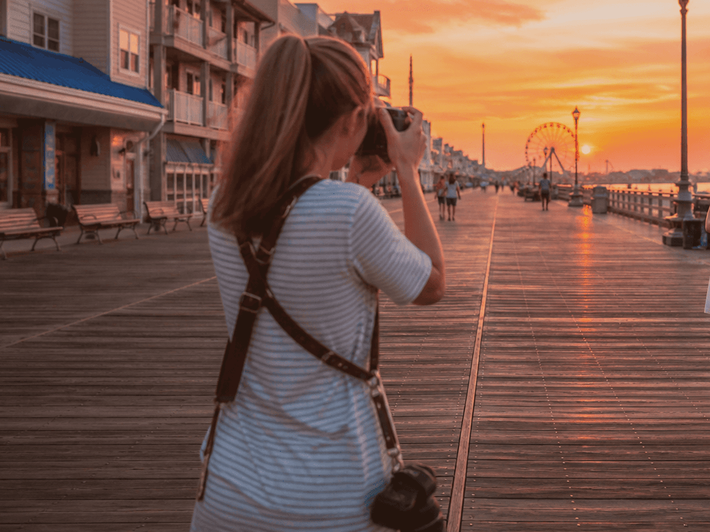 Engagement photo hour on the boards: light, timing, and crowd diplomacy — supporting Beach Blog photo, Ocean City, Maryland