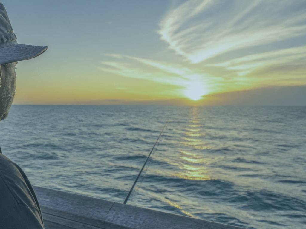 Hat chin strap on the windy pier — supporting Beach Blog photo, Ocean City, Maryland