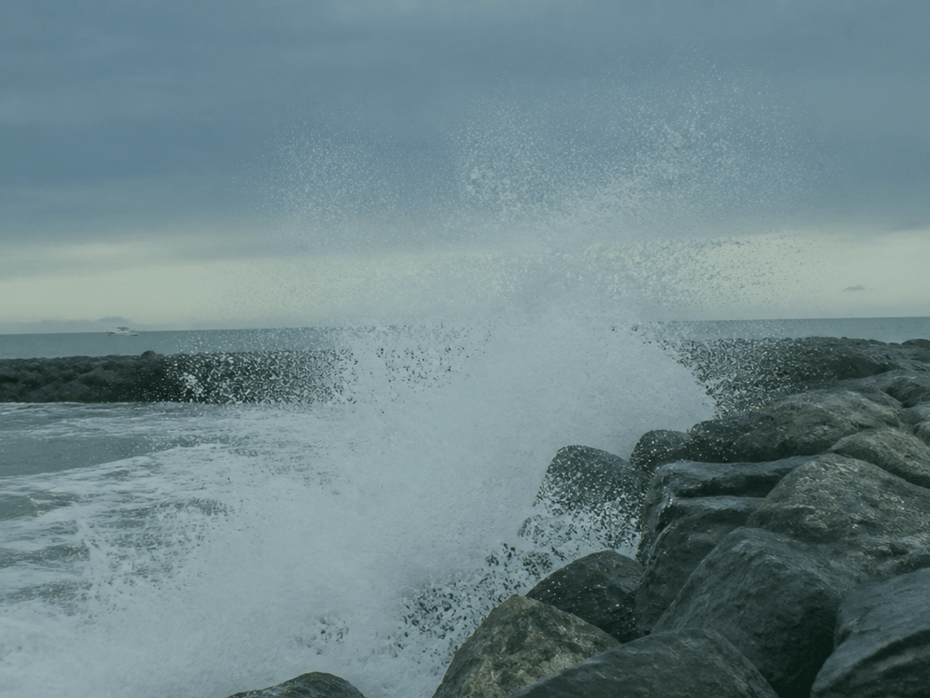 Inlet jetty spray: cover the phone before the selfie — supporting Beach Blog photo, Ocean City, Maryland