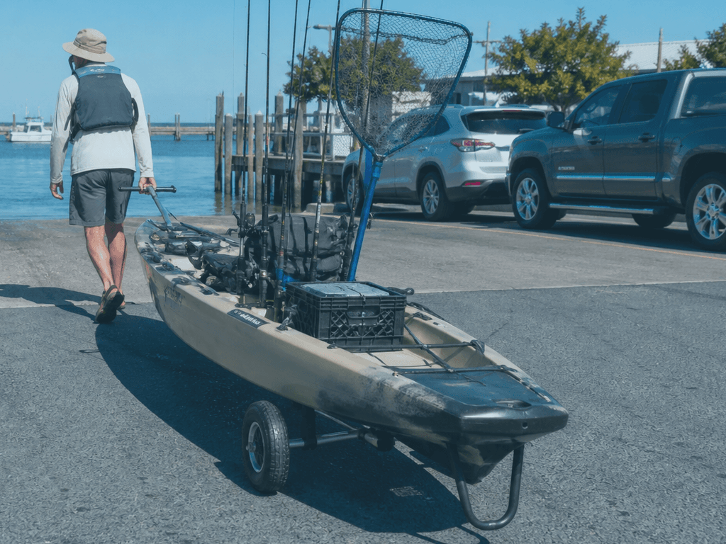 Kayak cart lot-to-launch haul: wheels save shoulders — supporting Beach Blog photo, Ocean City, Maryland