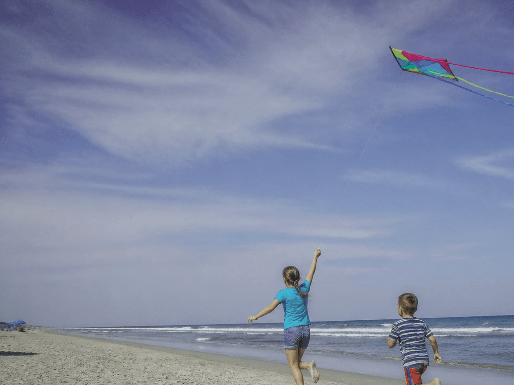 Kite day on the beach with kids: wind helpers, tangle diplomacy, joy altitude — supporting Beach Blog photo, Ocean City, Maryland