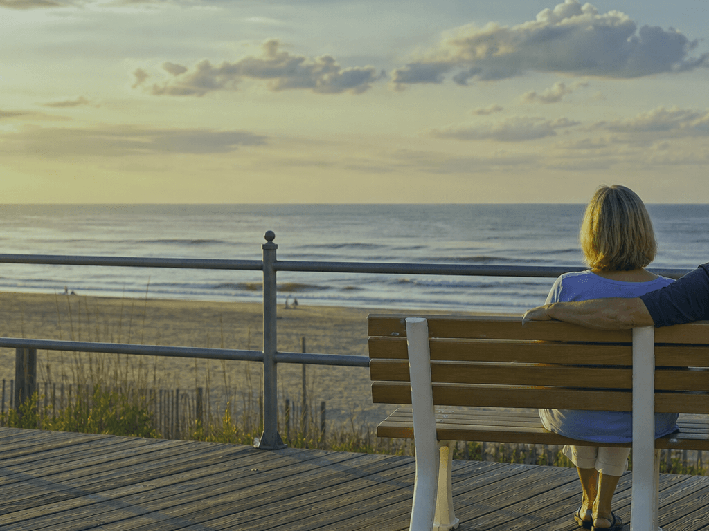 Ocean City Boardwalk bench break: rest before the group runs out of patience — supporting Beach Blog photo, Ocean City, Maryland