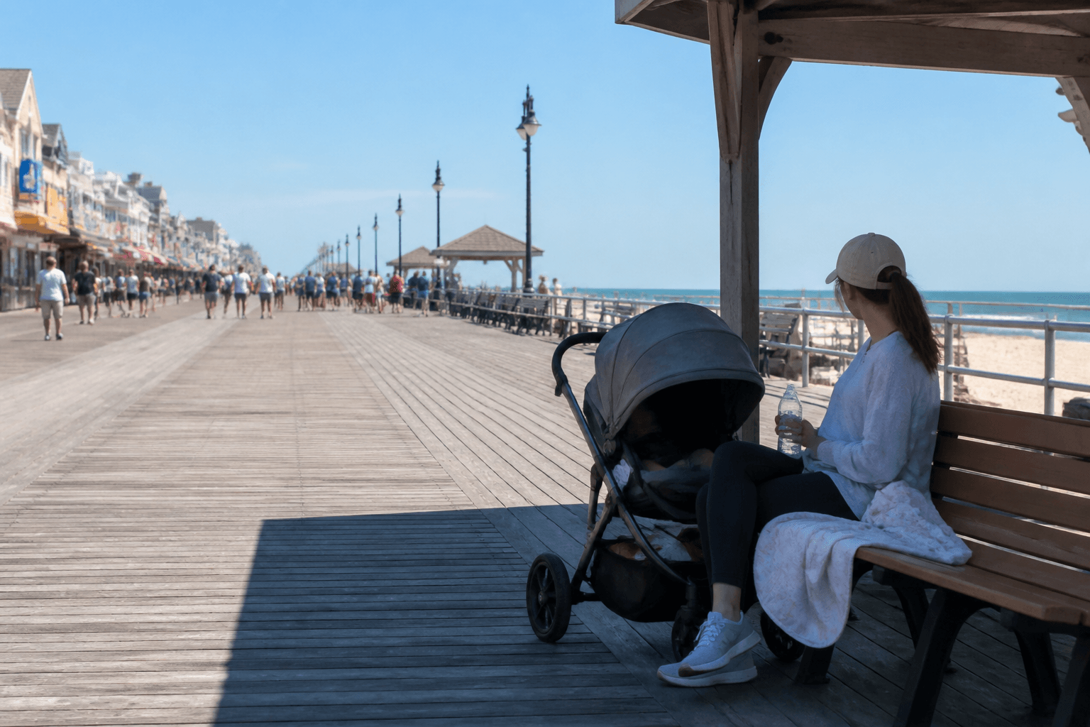 Ocean City Boardwalk stroller shade break: stop before the stroller nap becomes a protest — Beach Blog photo, Ocean City, Maryland