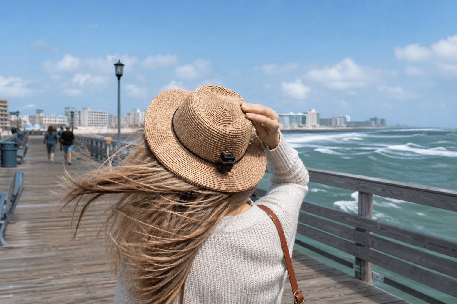 Ocean City pier wind hat clip: secure the brim before the breeze does — Beach Blog photo, Ocean City, Maryland