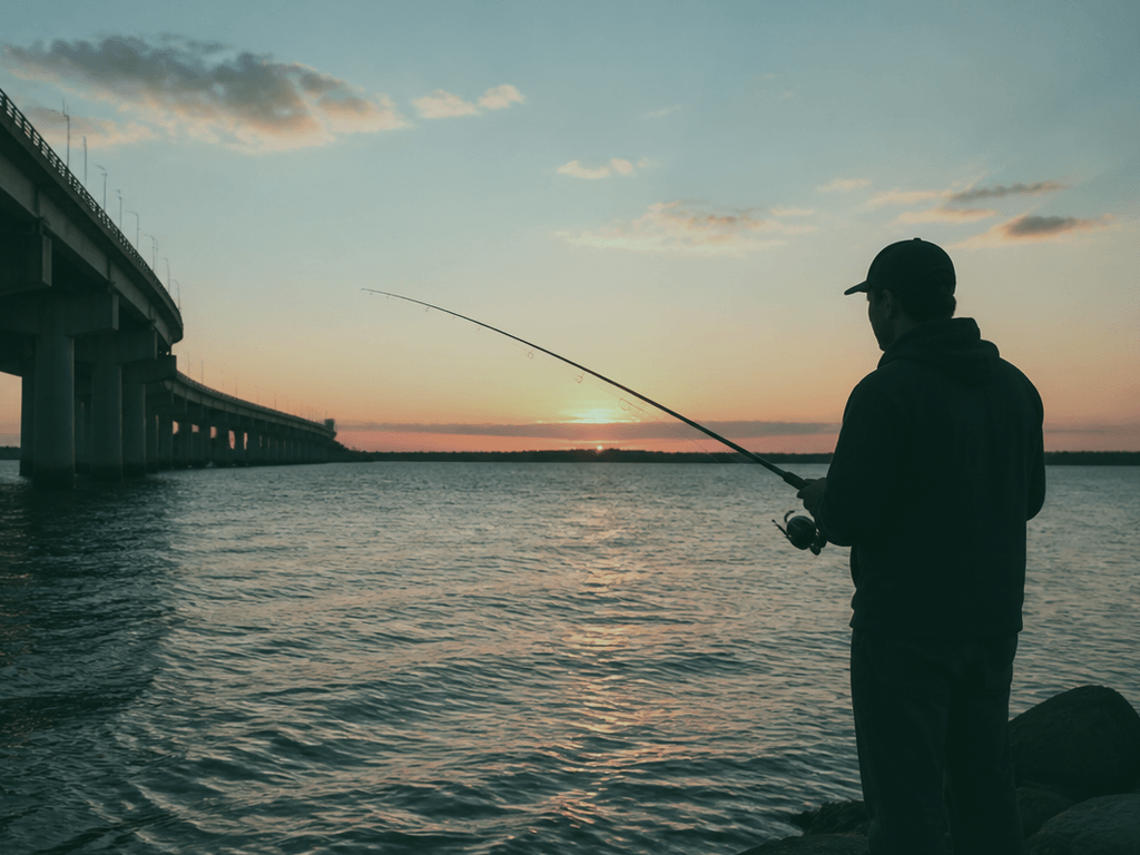 Route 50 bridge evening stripers: a short Ocean City rod session after the beach day — supporting Beach Blog photo, Ocean City, Maryland