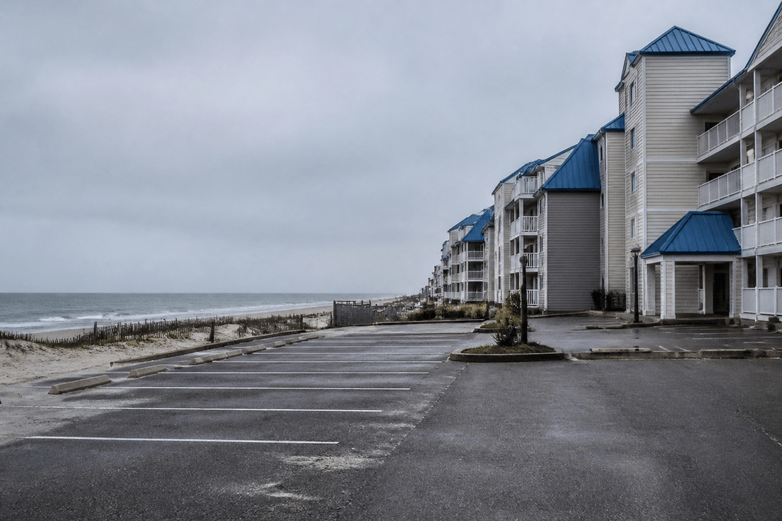 Quiet Ocean City Maryland hotel exterior in winter off-season facing a muted ocean — Beach Blog photo