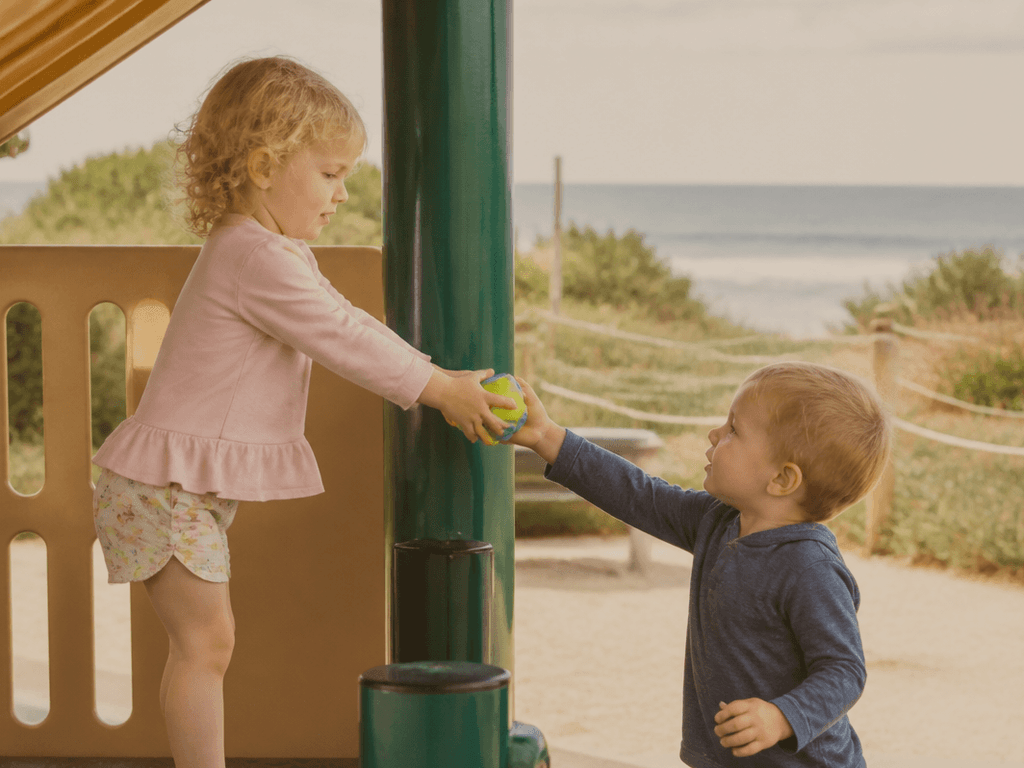 Playground to beach handoff with toddlers: burn wiggles, then claim sand — supporting Beach Blog photo, Ocean City, Maryland