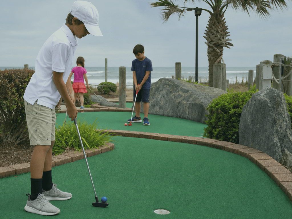 Putt-putt wind aim: adjust or watch balls fly — supporting Beach Blog photo, Ocean City, Maryland