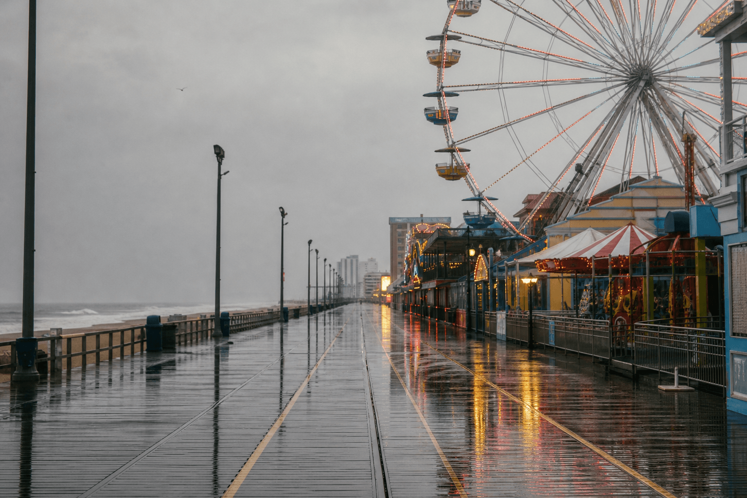 Rainy Boardwalk soft light: wet wood, soft neon, and a quieter Ocean City afternoon — Beach Blog photo, Ocean City, Maryland