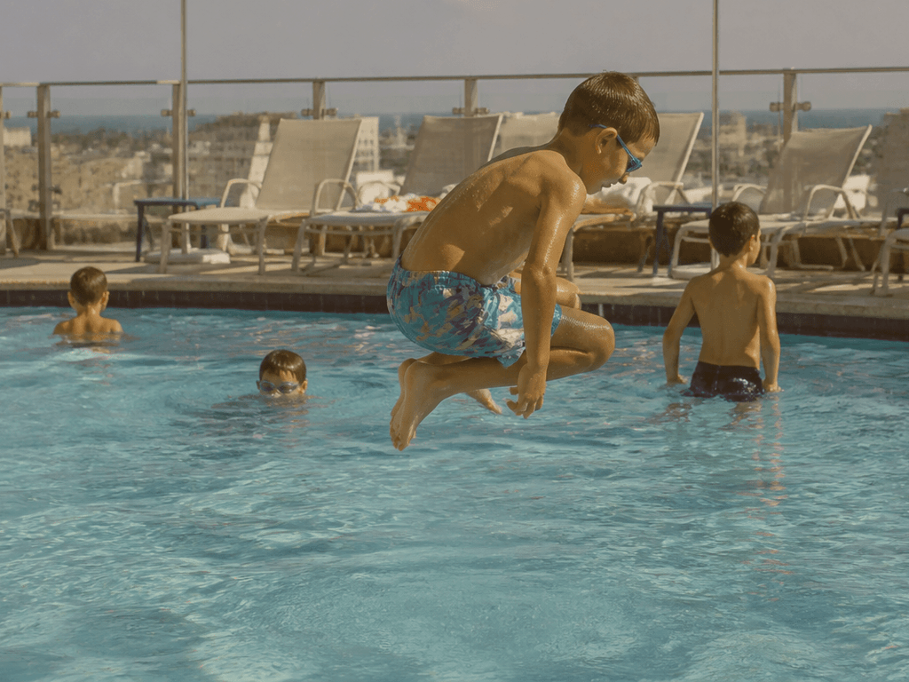 Rooftop pool heat escape with kids: shade chairs, time caps, elevator logistics — supporting Beach Blog photo, Ocean City, Maryland
