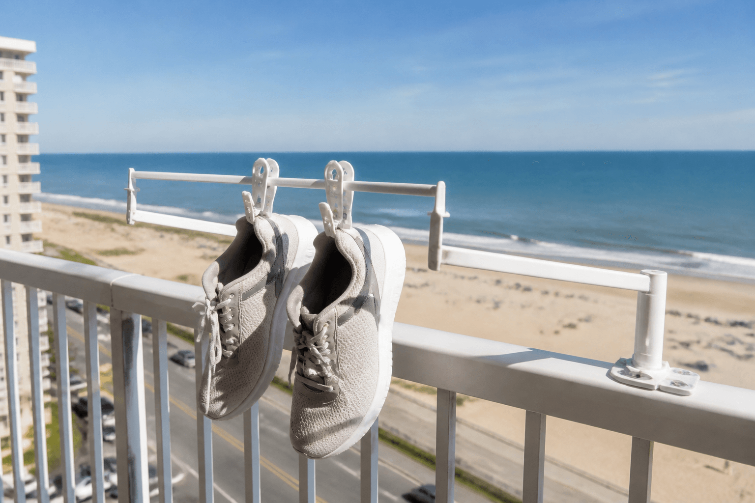 Shoe dryer rack on the balcony rail: air beats odor — Beach Blog photo, Ocean City, Maryland