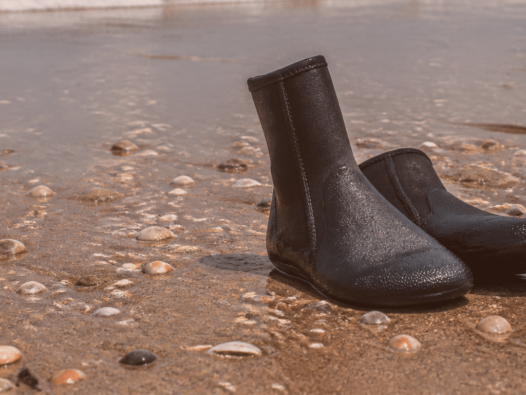 Wetsuit booties vs shell cuts on hard sand — supporting Beach Blog photo, Ocean City, Maryland