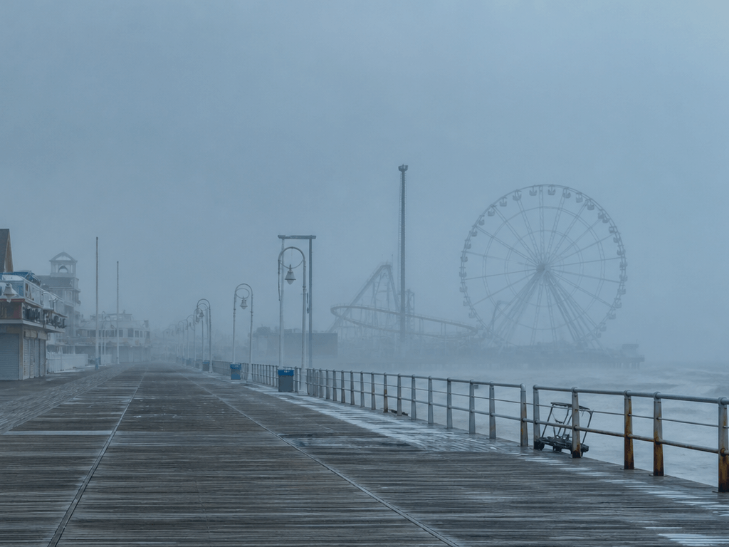 Winter Boardwalk: empty planks, loud ocean, softer neon — supporting Beach Blog photo, Ocean City, Maryland
